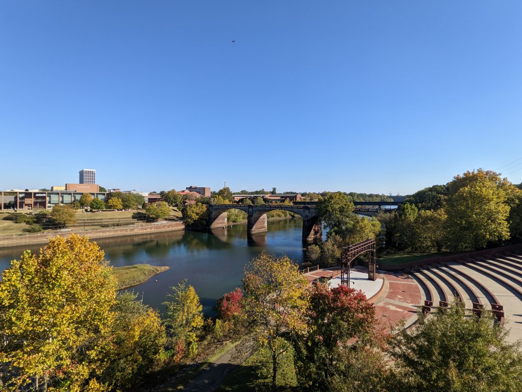 Chattahoochee riverfront, historic bridge, and amphitheater in Columbus, Georgia during fall