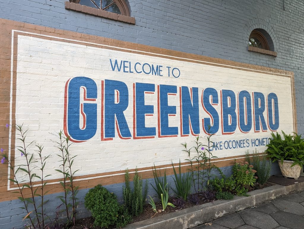 Welcome to Greensboro, Lake Oconee's Hometown, painted mural on a brick building
