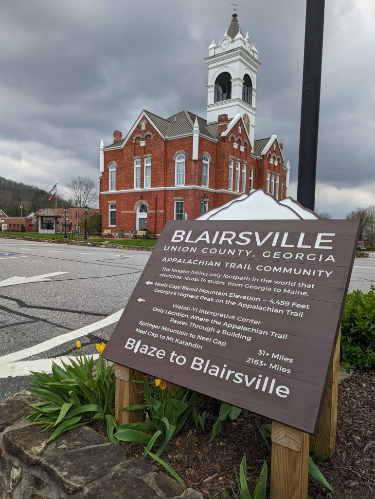 Historic Union County courthouse and Appalachian Trail community sign in Blairsville, Georgia